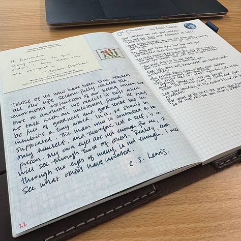 Brown leather notebook cover and page spreads
