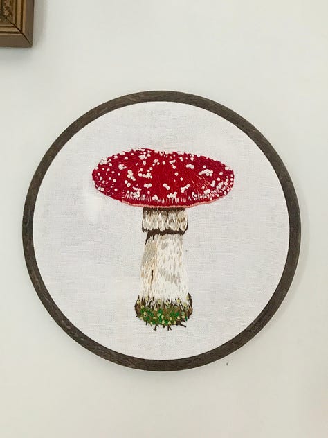 6 photos of embroidery pieces done by me ranging from realistic to stylised animals, phrases, food, anatomy and mushroom.