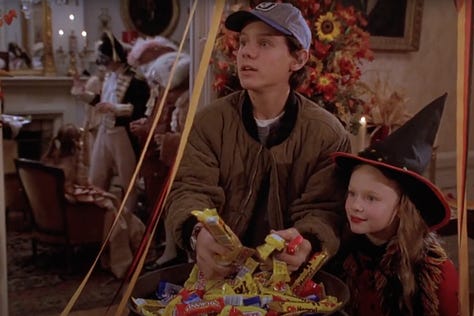 In Hocus Pocus (1993), Max and Dani trick or treat at Alison's house and drink cider against a backdrop of a Halloween costume party and candy