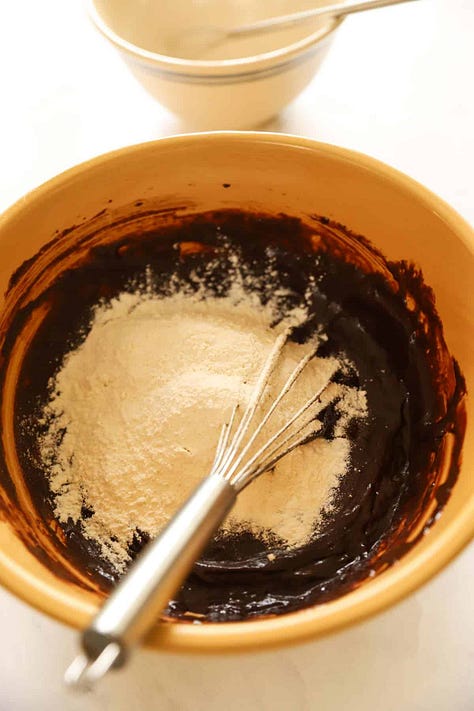 6 process shots of making a brownie skillet cake