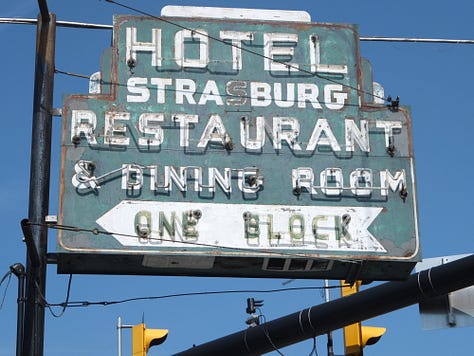 1950s sign for diners, hotels, restaurants, and businesses.