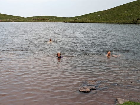 wild swimming on pen y fan in the brecon beacons