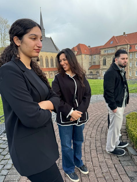 People looking at a monastery