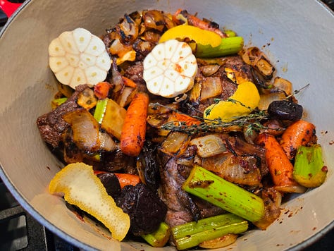 Left: seared short ribs in a dutch oven.  Center: short ribs with caramelized mirepoix, lemon zest, and garlic.  Right: braised short ribs with its braising liquid and vegetables.