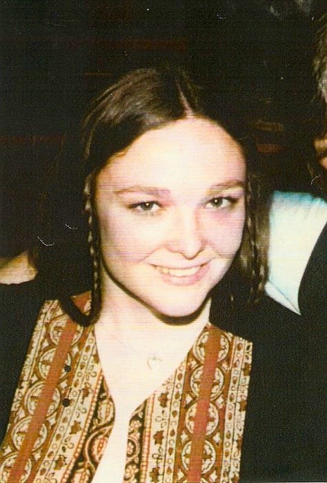 Yellowed photos of a laboratory bench with shelves full of books, vials full of chemicals, etc. Also a picture of a very handsome woman with her hair in braids, smiling at the camera. 