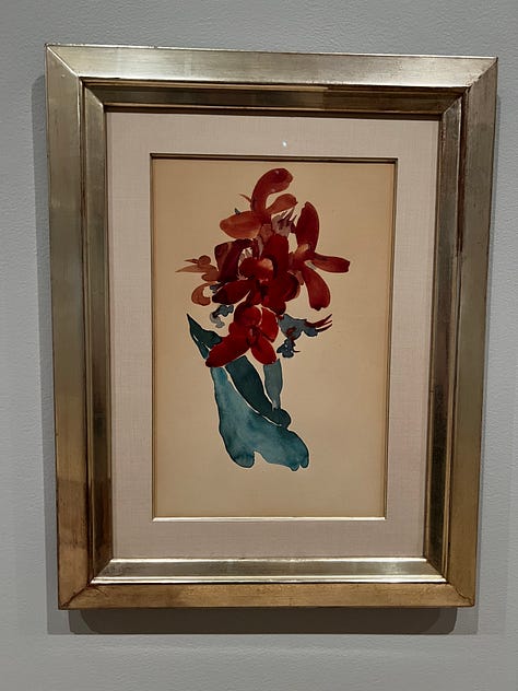 Images from the Georgia O'Keeffe show at the MoMA. Some are works on paper, mostly swirls; others are watercolors of nudes, sunrises, flowers, or rocks.