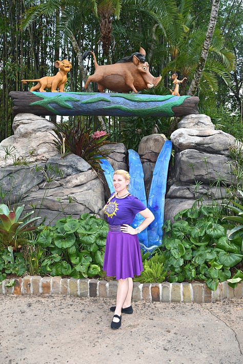 Pictures of Cass at Animal Kingdom on three different days, as evidenced by three different outfits