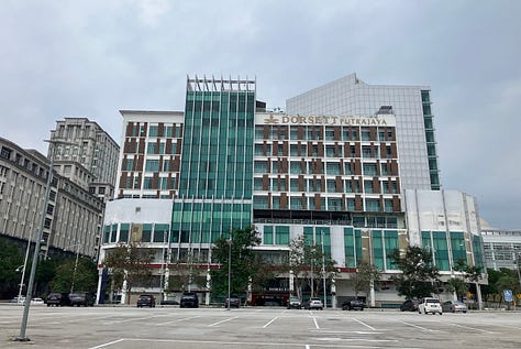 The outside of the Dorsett hotel; view of the Iron Mosque, view of bridge from 9th floor gym