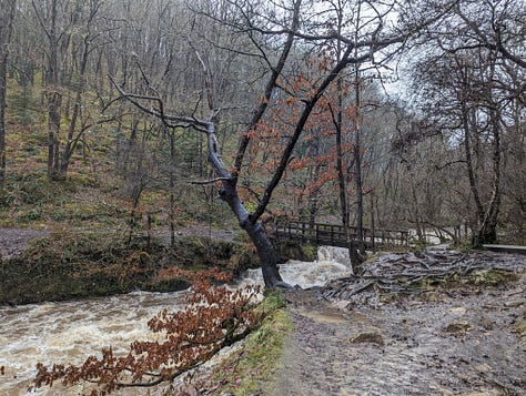 river in spate at Pontneddfechan in the waterfalls area of the brecon beacons