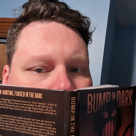 Photos of the print-on-demand version of the TTRPG Bump in the Dark.