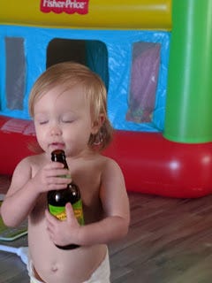 Officer Shawn Freeman of the Mesa Police Department was caught feeding a baby beer from a bottle labeled clearly as containing alcoholic beer, and he did so multiple times while smiling for photos.