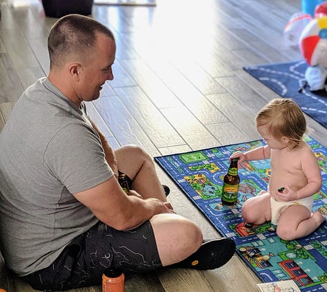 Officer Shawn Freeman of the Mesa Police Department was caught feeding a baby beer from a bottle labeled clearly as containing alcoholic beer, and he did so multiple times while smiling for photos.