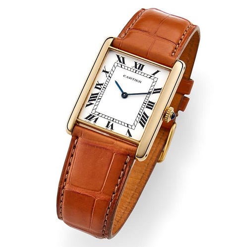 1970s vintage Cartier Tank Louis examples. 