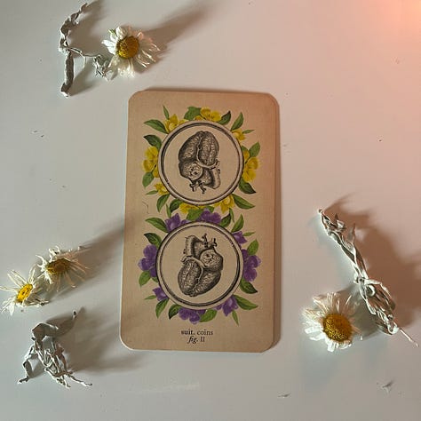 Varies depictions of the Two of Pentacles Tarot card