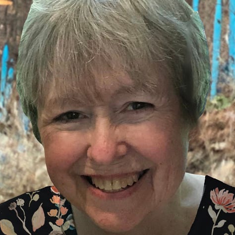 The author and her mother covered in a rainbow of thrown chalk dust, head-on-shoulder at the Fourth of July, and the obituary photo with her favorite turquoise Chihuly blown glass reeds behind her. Always with huge, matching smiles. Always.