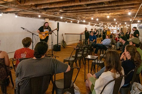 Music from Garry Walden and Tiny Joy in the loft at Iron Society Salon