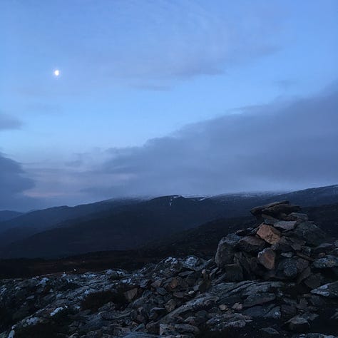 Images: 1. up on Craigellachie summit at 8.30am; 2. me on Craigellachie summit with Aviemore and Cairn Gorm in the windy backdrop; 3. Hoka trail shoes in micro crampons on wet peaty ground; 4. the wet peat bog “trail” down from Craigellachie; 5. looking disgruntled at the bottom of the hill.