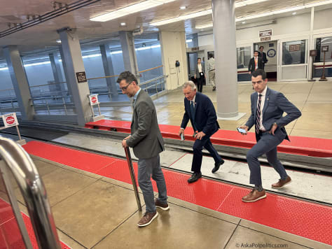 Sen. Tommy Tuberville catches Senate tram.