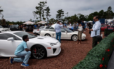 Photos of Japanese sports cars such as the Lexus LFA, Acura NSX and Nissan Skyline GT-R shown on the lawn of the Pebble Beach Classic Car Forum during Car Week 2024.