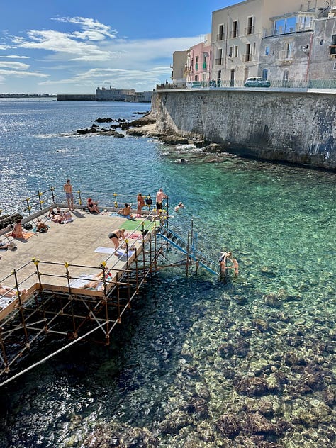  People swimming and lounging at the Solarium Forte Vigliena: Gillian Knows Best guide to Ortigia