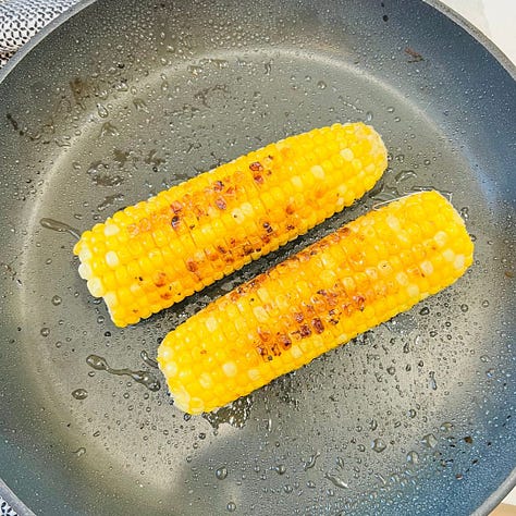 a creamy combination of black beans, sweet roasted corn, and earthly spices.