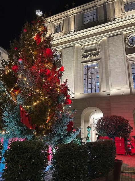 Lyon France street scenes, shops, monuments, restaurants. A skillet filled with frogs' legs frying, a Christmas tree and Christmas dinner menu, plus a bed in Germany with two separate comforters!