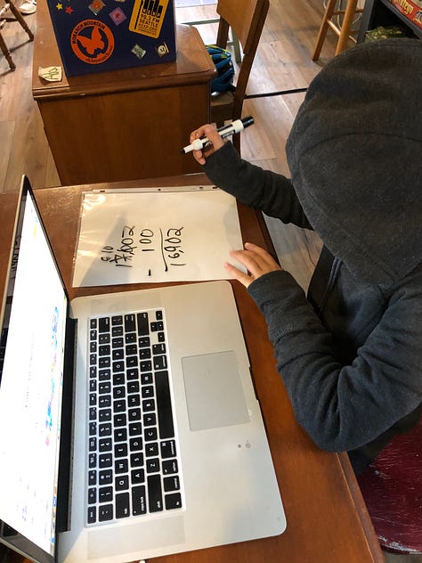 kid sitting at a desk doing math, kid lying on the floor with a laptop doing situps, three kids holding a microphone and recorder, interviewing a stuffed bear