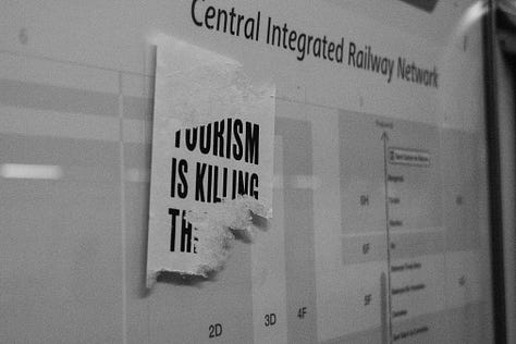 Image 1: "Tourists no go to my home" Image 2: "Tourism is killing the..." Image 3: "Tourists go home"