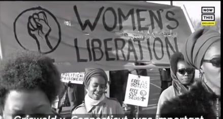 Colourful images of women from Pacific, India, Africa and the US at women's right protests with banners and placards featuring the women's sign as well as badges, singlets and posters with the same symbol. 