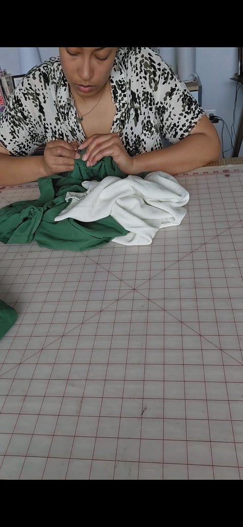 A grid of 6 images showing the deconstruction and reconstruction process: 1) scissors and a seam ripper on top of shirt pieces, 2) a panel of a shirt front in light green, 3) fabric pieces being pinned together, 4) fabric underneath the sewing machine foot, 5) a ball of dark green and light green threads, and 6) Ayana ripping seams at a worktable.