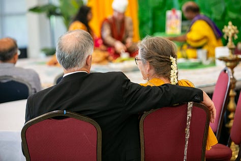 The mother of the groom with her mother, Puja lunch, the groom's parents.