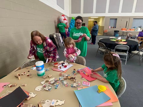 Craft table, Memory table with urn, face painting photo featuring Weston's sister.