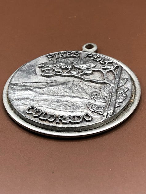 colorado mountain tokens and medals