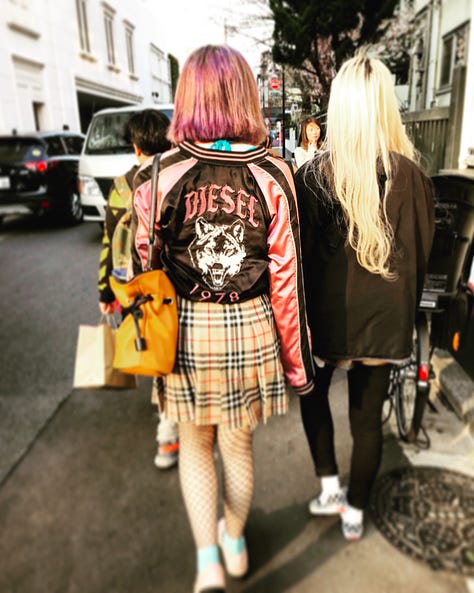 Pictures of a Japanese bento box full of rice, takoyaki, and green tea. Pictures of stylish young Japanese people in Harajuku. Picture of the author dressed in stylish clothes with Japanese graffiti behind him on the wall.