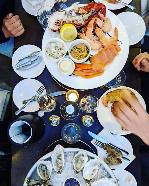 From left: Sam's Riverside Bar, seafood platter, and dining room