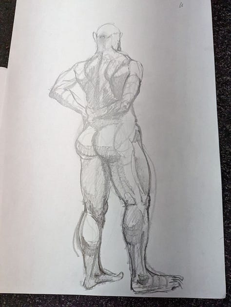 Male life model poses for life drawings