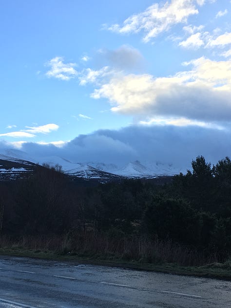 Images: 1. another beach to enter Loch Morlich from, with snowy-peaks closer in view; 2. after a two-minute dip in Loch Morlich; 3. clouds rush over the snow-capped Cairn Gorm hills where I believed I was heading in two days time.