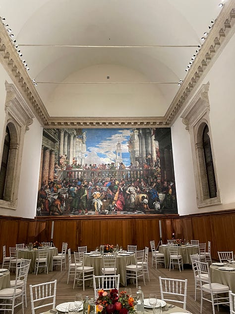 A beautiful mural in a grand hall; a view of Venice from a bell tower; a tiramisu