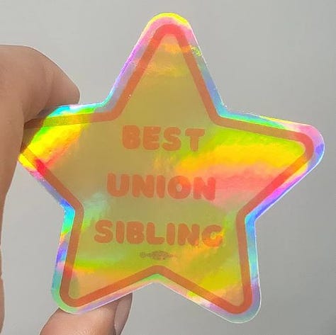 Pride flag that says "Proud Union Queer";' hands shaking over a rose in vintage tattoo style with the word "Solidarity" on a scroll; star that says "best union sibling"