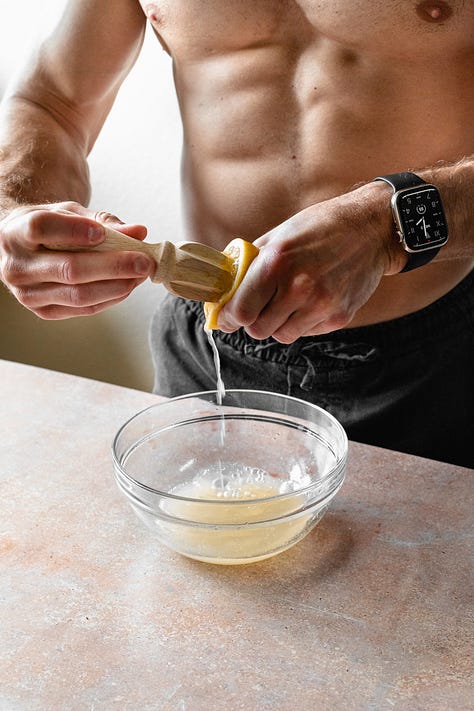Shirtless man in black pants makes vegan lemon curd step-by-step process shots
