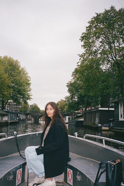 boats on a canal, woman in boat