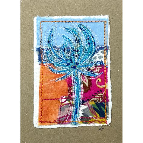 Fabric collage with stitched motif in contrasting colour
