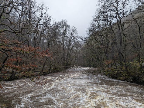 river in spate at Pontneddfechan in the waterfalls area of the brecon beacons