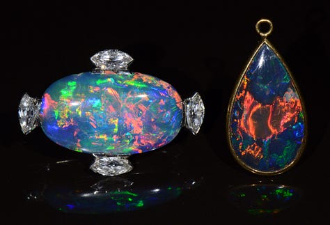 gem opals from around the world.  Some set in jewelry, others are pebble sized rocks.