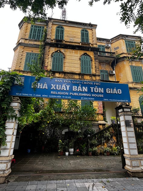 the Religion Publishing House, a pho stand, people cooking meat on the street for banh mi and bun cha, and Craft Link, a social enterprise shop encouraging economic development and helping rural women support themselves by "seeking new markets for traditional artisans."    