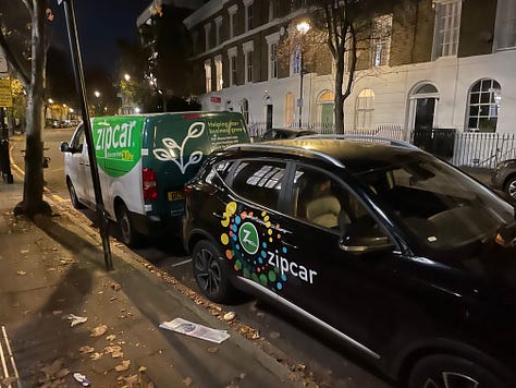 A variety of pictures of London streets at night. One shows a bus stop with people waiting at it. Another a bike locker and other bike parking. Another shows a van and car for hire. The rest show street scenes with Georgian town houses and empty streets lit by street lights