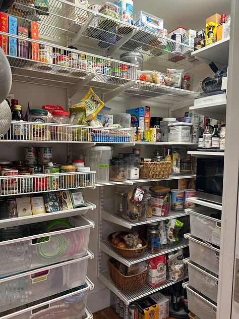 Clearing out the pantry; piles everywhere; the finished pantry