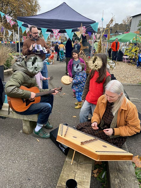 singing around the fire pit with various acoustic instruments, toasting marshmallows