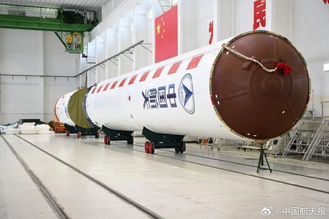 Hardware for the Long March 2D being prepared for integration at Jiuquan along with the rockets fairing heading to the launch pad.