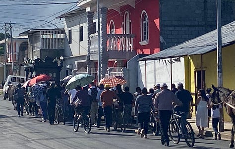 A funeral procession on Calle Nueva in Granada, Nicaragua